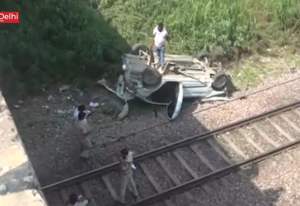 Car Falls Onto Railway Tracks From Flyover
